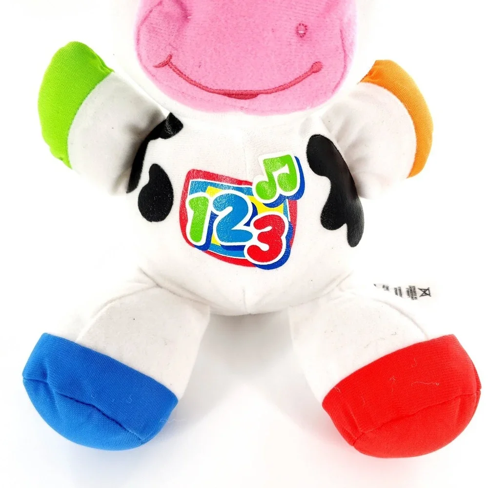 Fisher-Price Laugh & Learn Musical Learning Cow Plush Toy